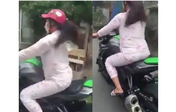 Thiếu nữ Việt phóng mô tô như bay trên đường làng 