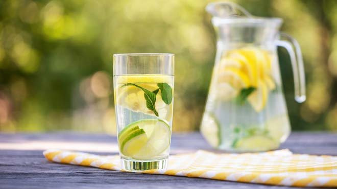 lemons-and-limes-in-water-glass.jpeg