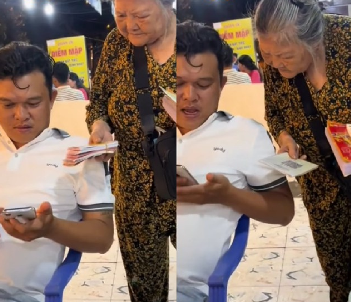 Hình ảnh một cụ bà bán vé số dùng mã QR từng được chia sẻ nhiều trên mạng xã hội - Ảnh: Internet 
