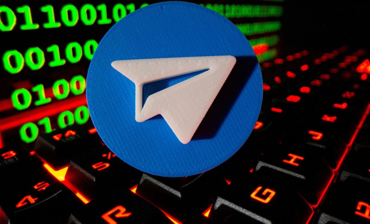 3d-printed-telegram-logo-pictured-keyboard-front-binary-code-this-illustration-taken.jpg