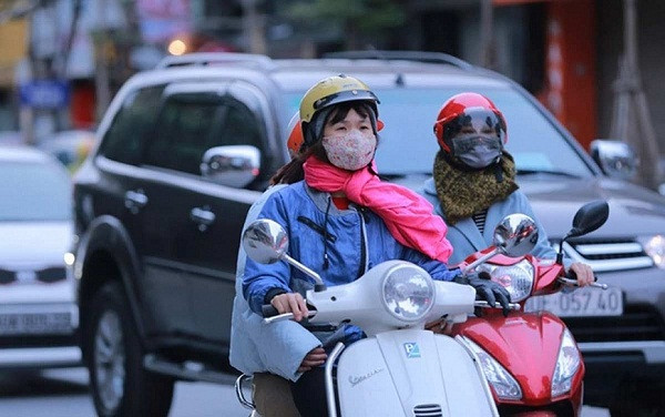 Thời tiết hôm nay 30.1: Không khí lạnh tràn về, Hà Nội rét run trong mưa nhỏ