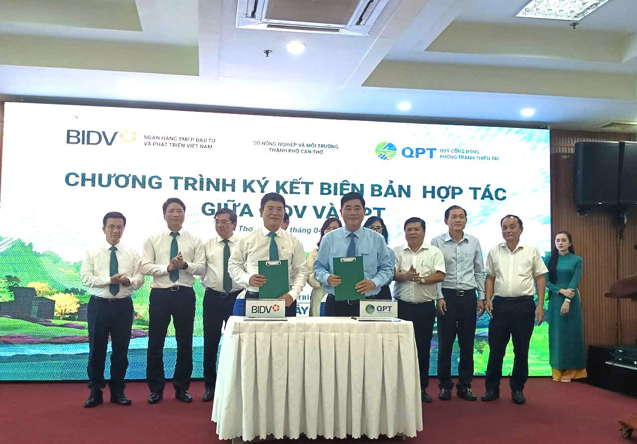 Lễ ký kết giữa BIDV và QPT - Ảnh: V.K.K
