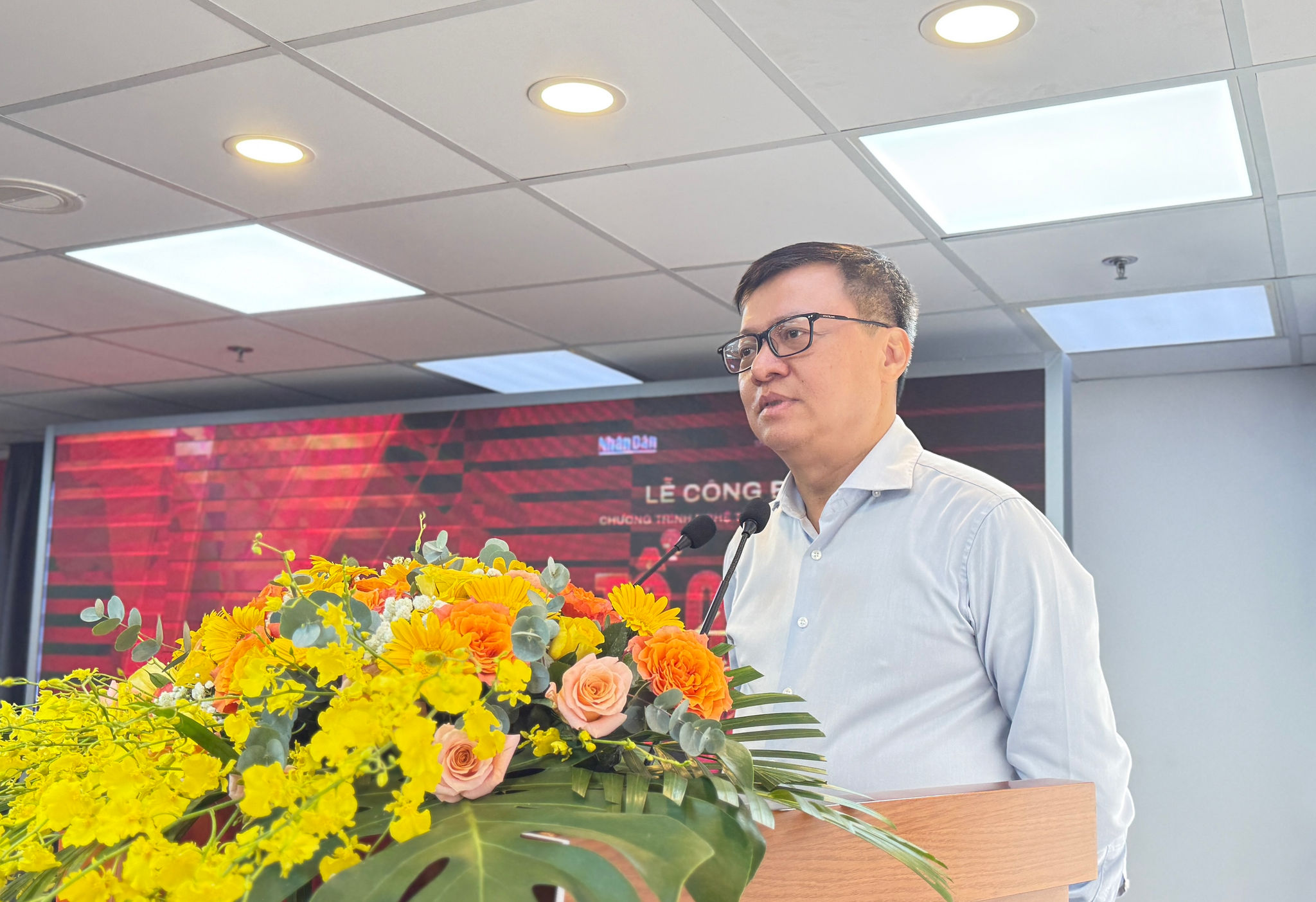 Ông Lê Quốc Minh, Tổng Biên tập Báo Nhân Dân phát biểu tại buổi công bố chương trình. Ảnh: Tiểu Vũ