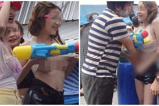Cô gái cho đàn ông sàm sỡ ở lễ hội té nước gây phẫn nộ