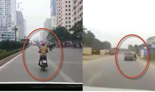 Clip xe máy đánh võng giữa đường Hà Nội bị ô tô chèn ngã, cô gái cản đường xe buýt nhanh