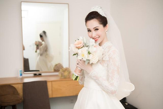NTK Lê Thanh Hòa và chiếc váy cưới của Hoa hậu Thu Thảo
