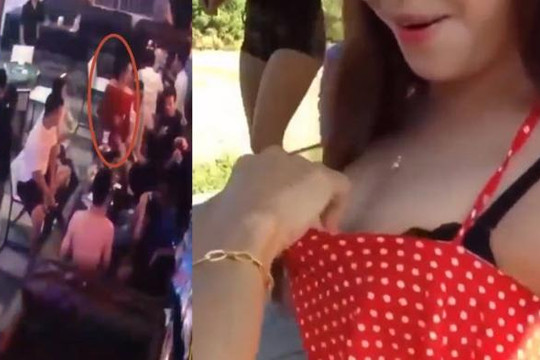 Vợ phang ly bia lên đầu gái dịch vụ karaoke được chồng boa tiền vào ngực ở Hà Nội