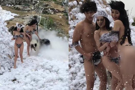 2 mỹ nữ mặc nội y nhỏ xíu chụp ảnh phản cảm giữa trời tuyết