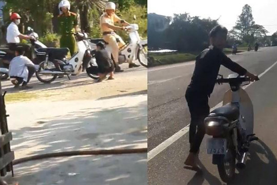 2 thanh niên Quảng Ngãi không mũ bảo hiểm bị CSGT bắt xì lốp xe máy, dắt về