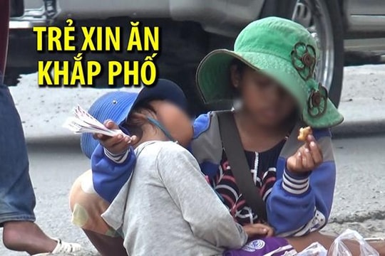 Trẻ em nói tiếng nước ngoài xin ăn khắp đường phố TP.HCM