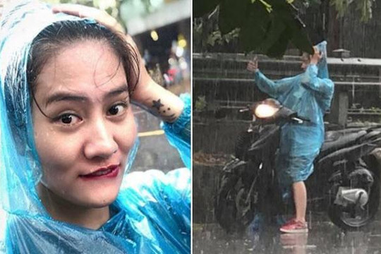 Clip Hà Nội mưa lớn giải nhiệt cho triệu người, diễn viên trẻ đẹp dừng SH chụp tự sướng