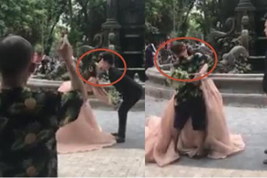 Chỉ cặp đôi tạo dáng không được, thợ chụp ảnh cưới ở Hà Nội bực bội hôn cô dâu