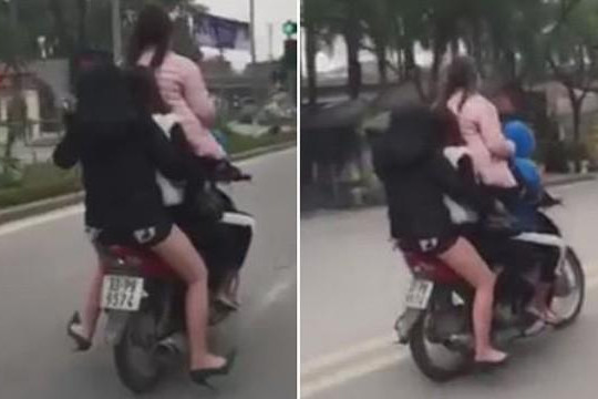 Xe máy chở 4 cô gái đầu trần phóng vun vút trên đường gây bức xúc