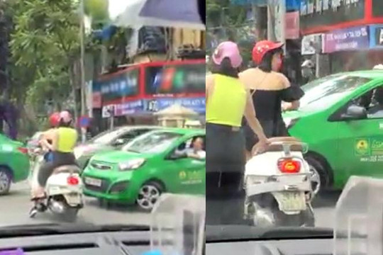 Đỗ xe sai luật khi dừng đèn đỏ còn chửi tài xế taxi, người phụ nữ bị CSGT Hà Nội xử phạt