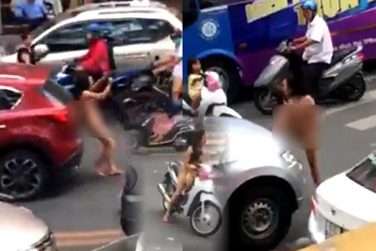 Clip người mẹ khỏa thân dừng xe chở con gái giữa đường Sài Gòn, đạp và tông ô tô