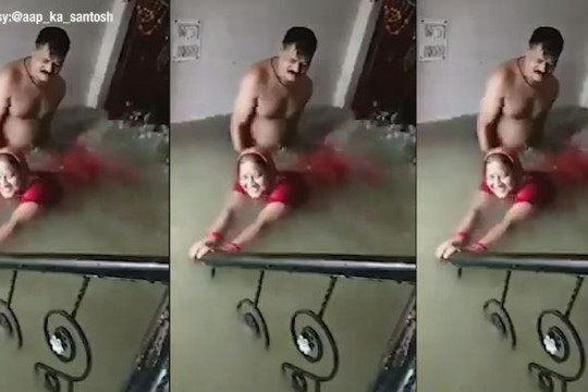 Tranh thủ nước mưa tràn vào nhà, chồng dạy vợ tập bơi