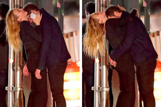 Liam Hemsworth ôm hôn tình mới trên phố đông người