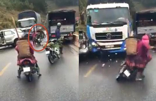 Clip mẹ chở hai con bị ô tô tải tông khi đi xe qua hiện trường tai nạn