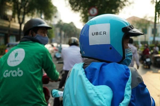 Grab mua lại Uber tại Việt Nam không phạm luật