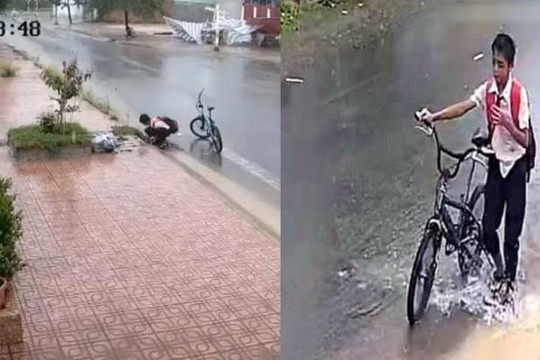 Clip cậu bé dắt xe dưới mưa dọn rác từng miệng cống: Hành động đẹp lan tỏa trên Facebook