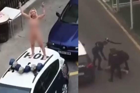 Clip người phụ nữ khỏa thân phản đối cảnh sát bị đánh, đè xuống đường