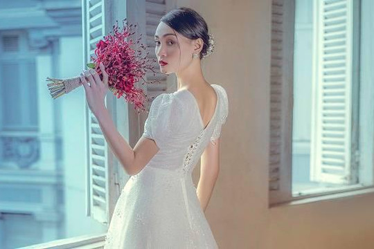 Thùy Trang Next Top mang vẻ đẹp mong manh trong BST áo cưới trắng tinh khôi