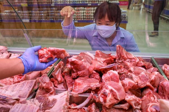 Bộ trưởng Lê Minh Hoan lý giải nguyên nhân giá thịt heo chênh lệch 