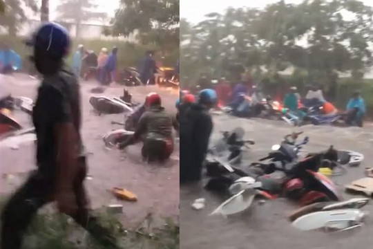 Clip nước mưa chảy cuồn cuộn như lũ cuốn phăng nhiều xe máy trên đường Đồng Nai